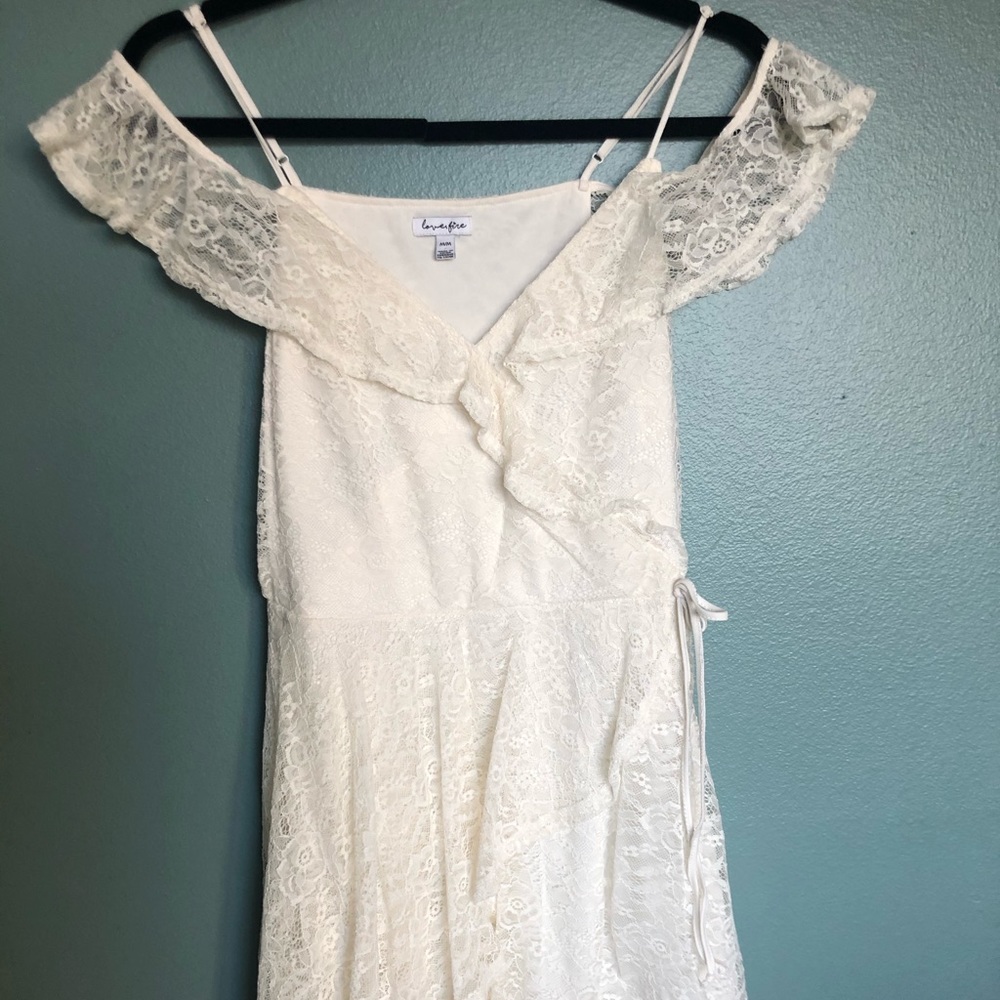 White lace mini dress with off shoulder details